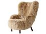 2_Petra Lounge Chair VB3 High Back_Walnut w. sheepskin honey 50mm._Angled front_1.jpg