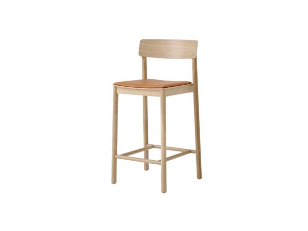 2_146197A235A030A502_Betty-Counter-Chair-TK14_Lacquered-Oak-w.-Noble-Leather-Cognac_Angled-Front-1200x1600.jpg