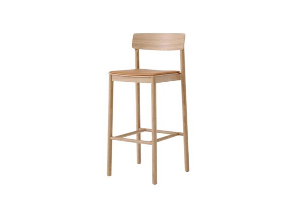 2_146215A235A190C121_Betty-Bar-Chair-TK17_Lacquered-Oak-w.-Noble-Leather-Cognac_Angled-Front-1200x1600-Photoroom.jpg