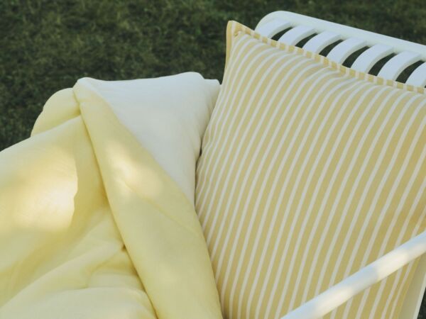 5_Air Quilt soft yellow_Terrazza Cushion Bold Stripe yellow_Palissade Cantilever Dining Armchair cream white.jpg