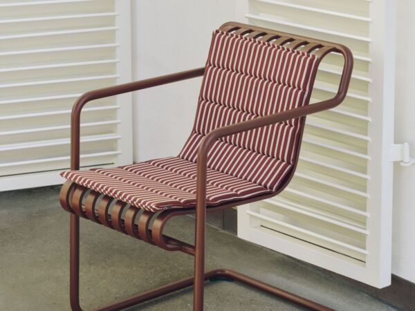 5_Terrazza Folding Seat Cushion Bold Stripe Terracotta_Palissade Cantilever Dining Armchair iron red.jpg
