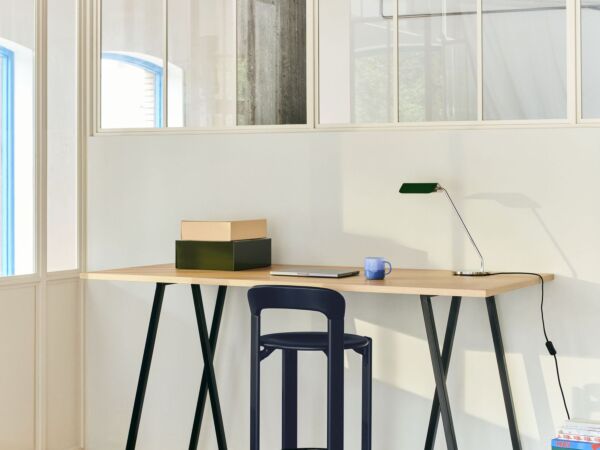 5_Loop Stand High Table_L160xW77,5xH97 wb lacquered oak tabletop_black powder coated steel frame_Rey Bar Stool deep blue wb lacquer beech_Apex Desk Lamp emerald green.jpg